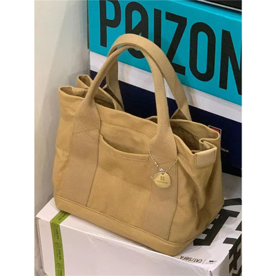 2024 NEW HIGH-END SENSE OF NICHE DESIGN CANVAS TOTE BAG BAG DOMASCHE MODA TUTTI I VINTAGGI SINGLE SHOULDER BACCHETTO a spalla trasversale
