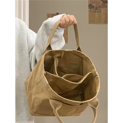2024 NEW HIGH-END SENSE OF NICHE DESIGN CANVAS TOTE BAG BAG DOMASCHE MODA TUTTI I VINTAGGI SINGLE SHOULDER BACCHETTO a spalla trasversale