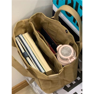 2024 NEW HIGH-END SENSE OF NICHE DESIGN CANVAS TOTE BAG BAG DOMASCHE MODA TUTTI I VINTAGGI SINGLE SHOULDER BACCHETTO a spalla trasversale